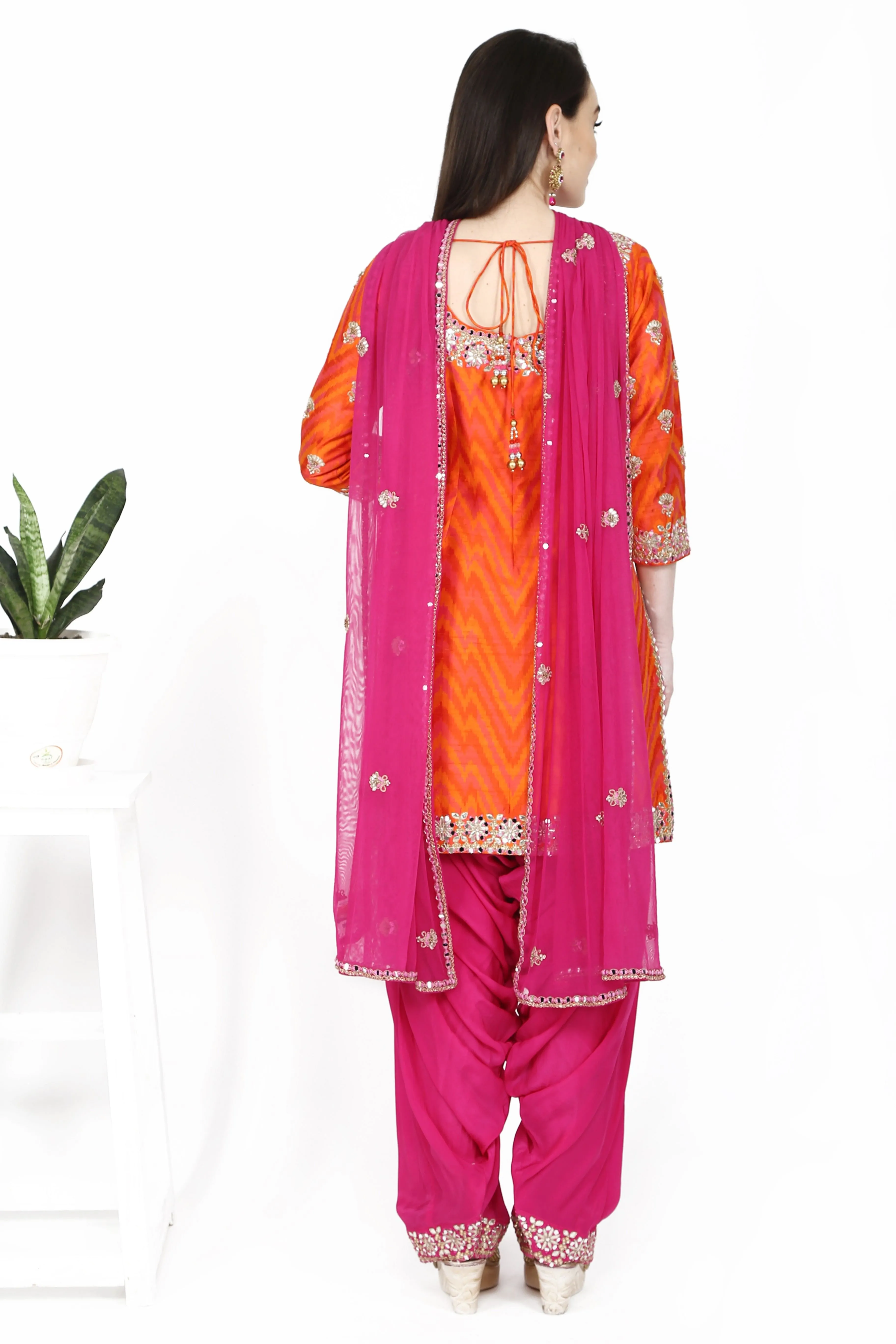 Orange and Magenta Kurta set.