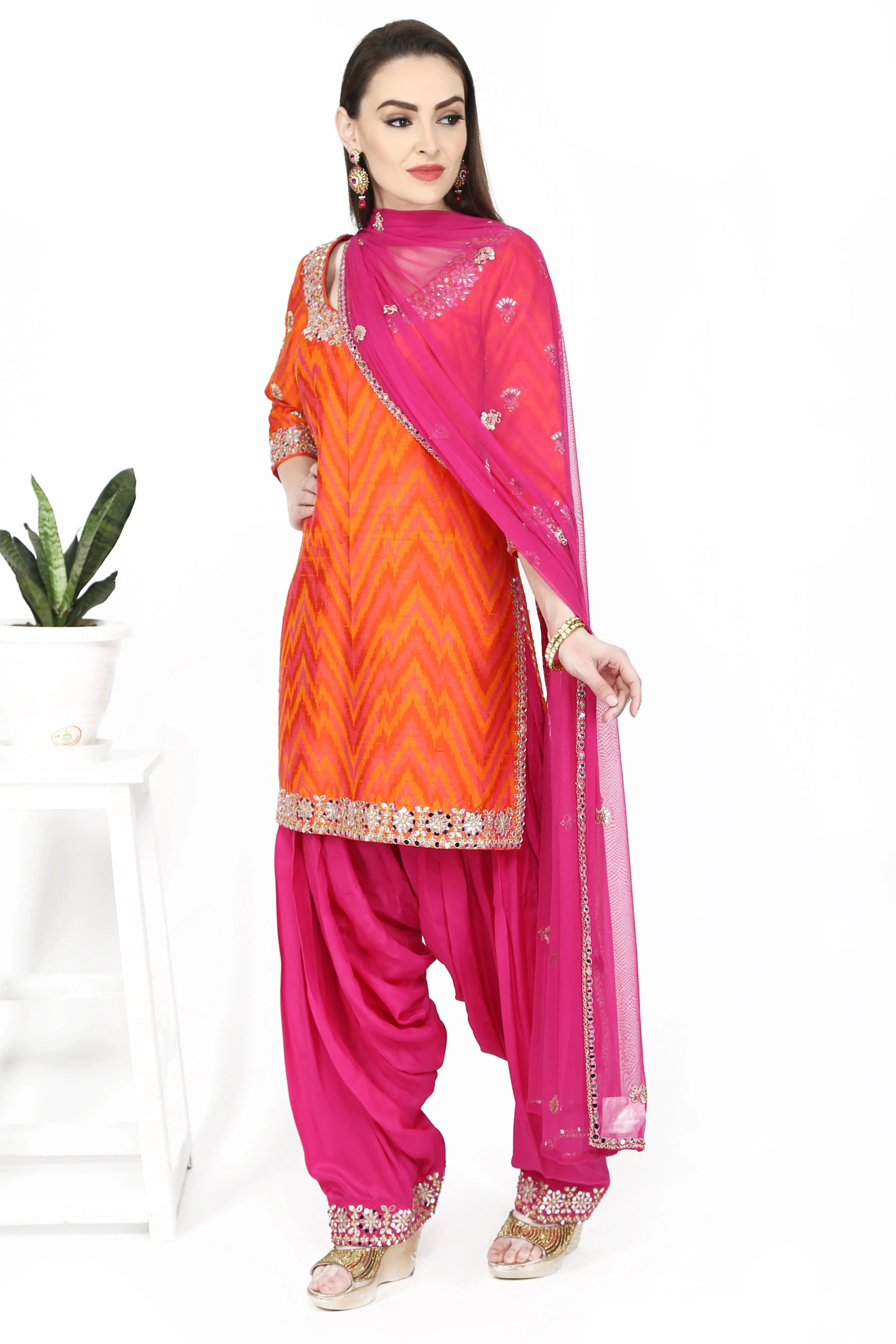 Orange and Magenta Kurta set.